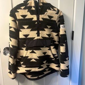 North Face Sherpa fleece anorak style.